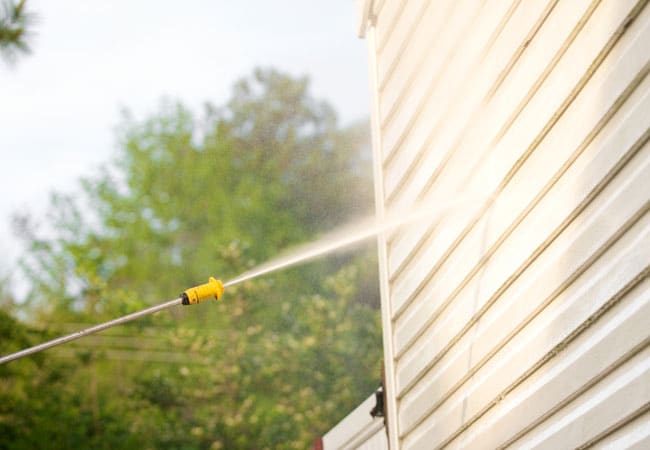 Pressure washing the house side